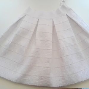 White skirt.